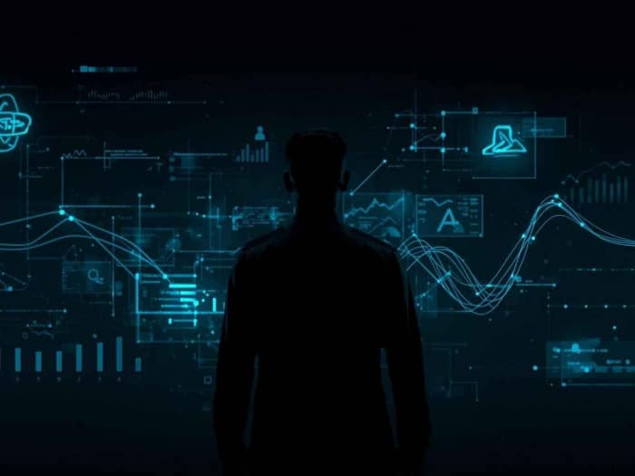 silhouette of a person facing a futuristic digital interface with glowing blue graphs, icons, and data charts on a dark screen, suggesting technology and innovation